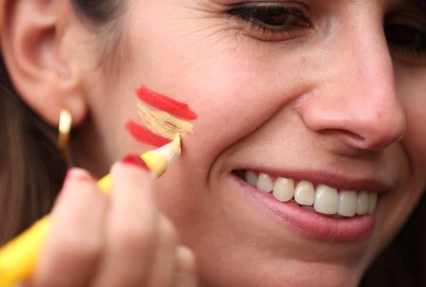 Spain fan has her face painted during the UEFA Euro 2020 Championship Semi-final match between Italy and Spain at Wembley Stadium on July 06, 2021 in...