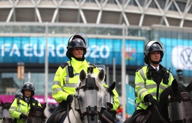 Police guard the stadium during the UEFA Euro 2020 Championship Semi-final match between Italy and Spain at Wembley Stadium on July 06, 2021 in...