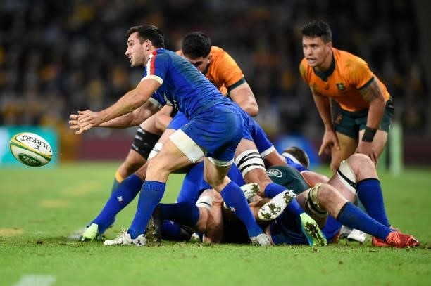 Baptise Couilloud of France passes the ball during the international Test match between the Australia Wallabies and France at Suncorp Stadium on July...