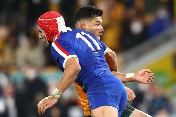 Noah Lolesio of the Wallabies is tackled by Gabin Villiere of France the international Test match between the Australia Wallabies and France at...