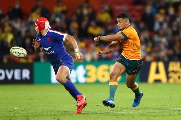 Hunter Paisami of the Wallabies passes during the international Test match between the Australia Wallabies and France at Suncorp Stadium on July 07,...
