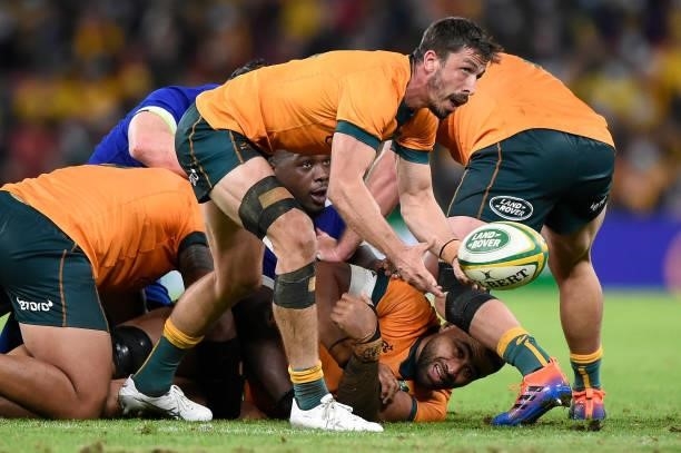 Jake Gordon of the Wallabies passes the ball during the international Test match between the Australia Wallabies and France at Suncorp Stadium on...