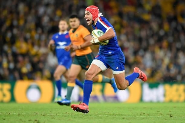 Gabin Villiere of France runs scores his second try during the international Test match between the Australia Wallabies and France at Suncorp Stadium...