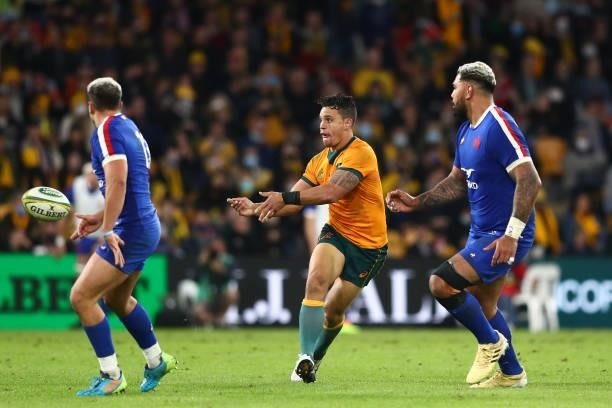 Matt To’omua of the Wallabies passes during the international Test match between the Australia Wallabies and France at Suncorp Stadium on July 07,...