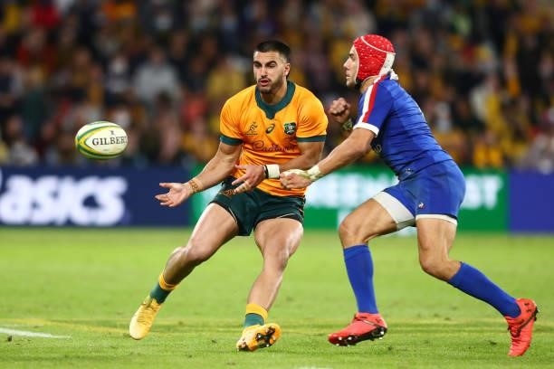 Tom Wright of the Wallabies passes during the international Test match between the Australia Wallabies and France at Suncorp Stadium on July 07, 2021...