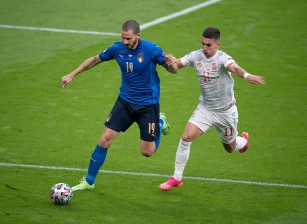 Leonardo Bonucci of Italy and Ferran Torres of Spain in action during the UEFA Euro 2020 Championship Semi-final match between Italy and Spain at...