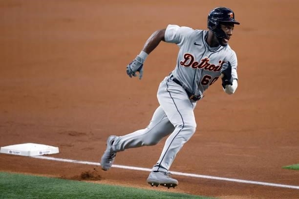 Akil Baddoo of the Detroit Tigers rounds third base on his way to score on a RBI single hit by Robbie Grossman of the Detroit Tigers in the top of...