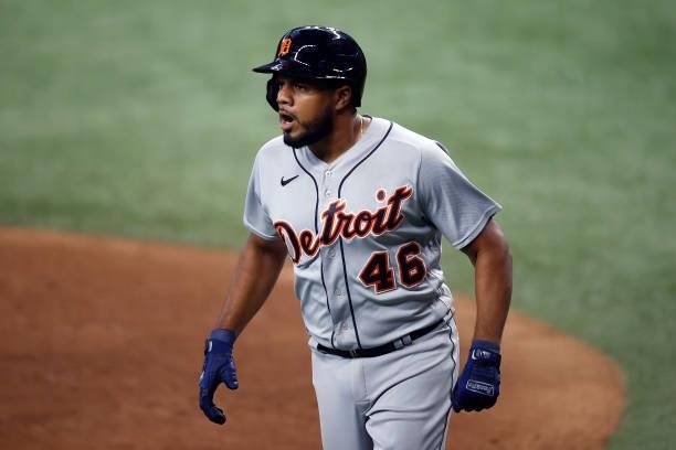 Jeimer Candelario of the Detroit Tigers celebrates after hitting a solo home run against the Texas Rangers in the top of the fourth inning at Globe...
