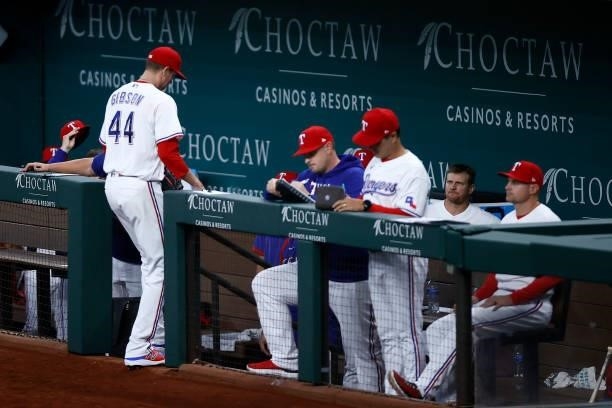 Kyle Gibson of the Texas Rangers walks off the mound after being pulled from the game against the Detroit Tigers in the top of the seventh inning at...