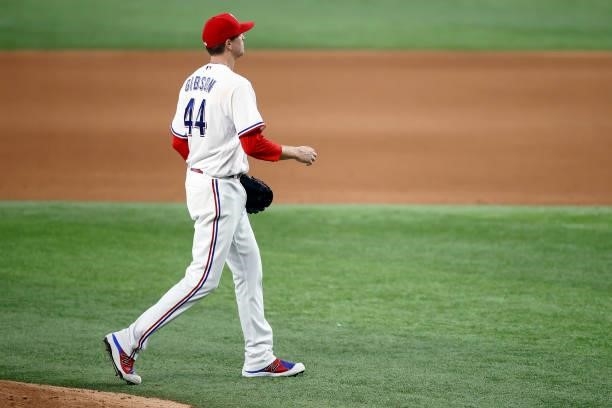Kyle Gibson of the Texas Rangers walks off the mound after being pulled from the game against the Detroit Tigers in the top of the seventh inning at...