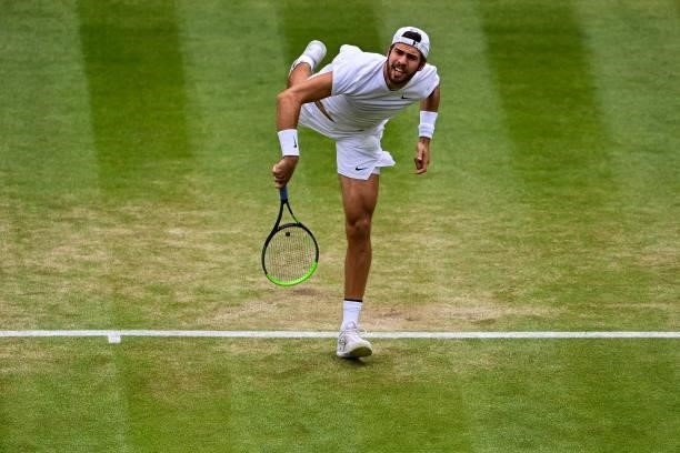 Karen Khachanov of Russia serves against Dennis Shapovalov of Canada in the quarter finals of the gentlemen's singles during Day Nine of The...