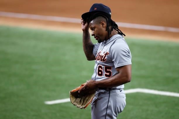 Gregory Soto of the Detroit Tigers reacts after striking out Jonah Heim of the Texas Rangers with the bases loaded in the bottom of the eighth inning...