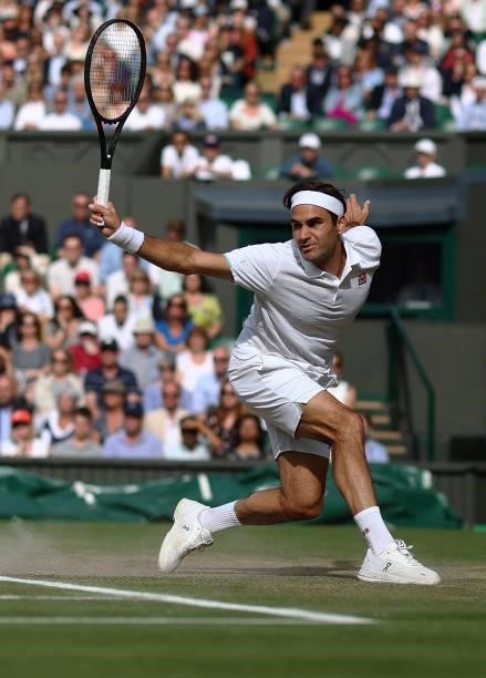 Roger Federer of Switzerland plays a backhand during his men's Singles Quarter Final match against Hubert Hurkacz of Poland on Day Nine of The...