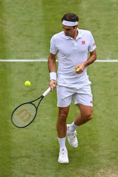 Roger Federer of Switzerland prepares to serve against Hubert Hurkacz of Poland in the quarter finals of the gentlemen's singles during Day Nine of...