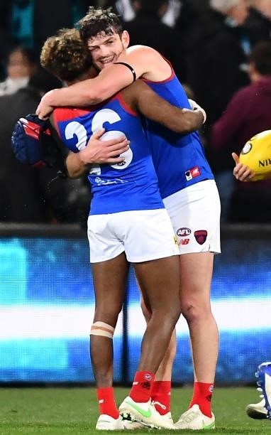Kysaiah Pickett of the Demons and Angus Brayshaw of the Demons hug after the final siren during the round 17 AFL match between Port Adelaide Power...