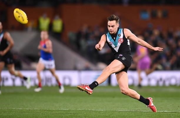 Karl Amon of Port Adelaide kicks during the round 17 AFL match between Port Adelaide Power and Melbourne Demons at Adelaide Oval on July 08, 2021 in...