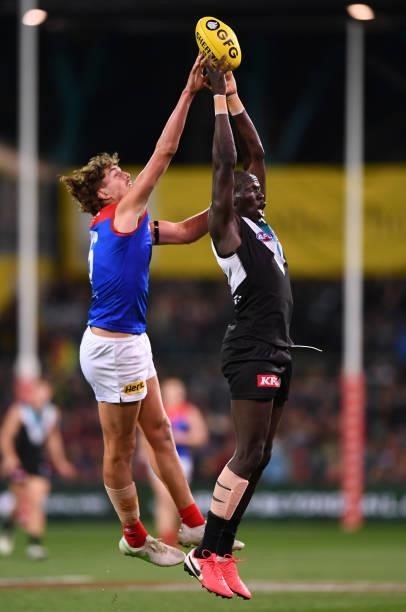Luke Jackson of the Demons competes with Aliir Aliir of Port Adelaide during the round 17 AFL match between Port Adelaide Power and Melbourne Demons...