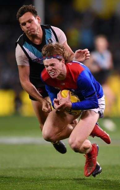 Jayden Hunt of the Demons marks in front of Steven Motlop of Port Adelaide during the round 17 AFL match between Port Adelaide Power and Melbourne...