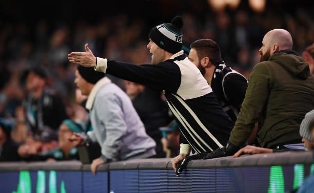 Port supporter during the round 17 AFL match between Port Adelaide Power and Melbourne Demons at Adelaide Oval on July 08, 2021 in Adelaide,...