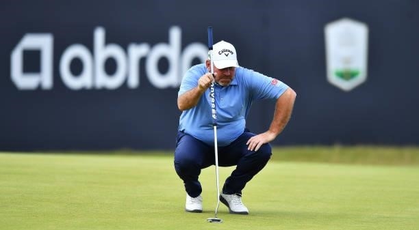 Thomas Bjorn of Denmark lines up a putt on the 18th green during Day One of the abrdn Scottish Open at The Renaissance Club on July 08, 2021 in North...