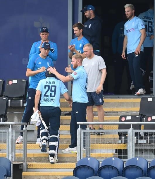 Ben Stokes congratulates Dawid Malan of England after England won the first One Day international between England and Pakistan at Sophia Gardens on...