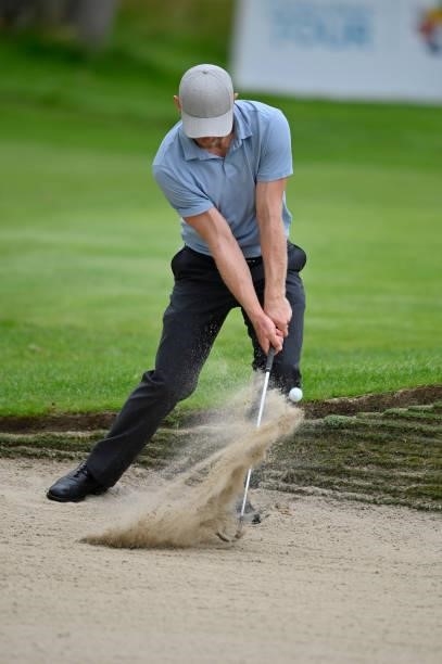 Scott Henry of Scotland gets out of the bunker on the 11th hole during Day One of Le Vaudreuil Golf Challenge at Golf PGA France du Vaudreuil on July...