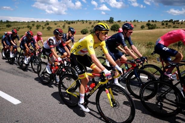 Tadej Pogačar of Slovenia and UAE-Team Emirates yellow leader jersey & Tao Geoghegan Hart of The United Kingdom and Team INEOS Grenadiers during the...