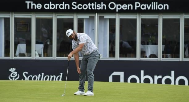 Jon Rahm of Spain looks on, after missing a putt on the 18th green during Day One of the abrdn Scottish Open at The Renaissance Club on July 08, 2021...