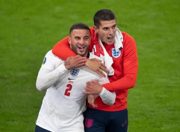 Conor Coady and Kyle Walker of England celebrate after the UEFA Euro 2020 Championship Semi-final match between England and Denmark at Wembley...