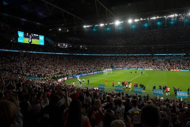 England players and staff celebrate in front of fans after the UEFA Euro 2020 Championship Semi-final match between England and Denmark at Wembley...