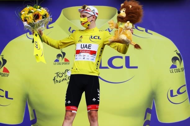 Tadej Pogačar of Slovenia and UAE-Team Emirates yellow leader jersey celebrates at podium during the 108th Tour de France 2021, Stage 12 a 159,4km...