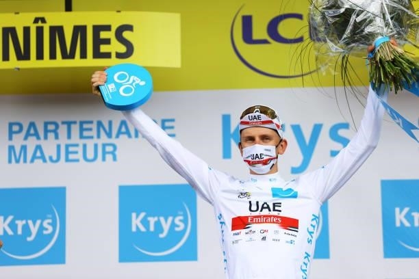 Tadej Pogačar of Slovenia and UAE-Team Emirates white best young jersey celebrates at podium during the 108th Tour de France 2021, Stage 12 a 159,4km...