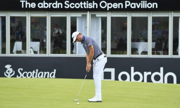 Justin Thomas of the United States makes a putt on the 18th green during Day One of the abrdn Scottish Open at The Renaissance Club on July 08, 2021...