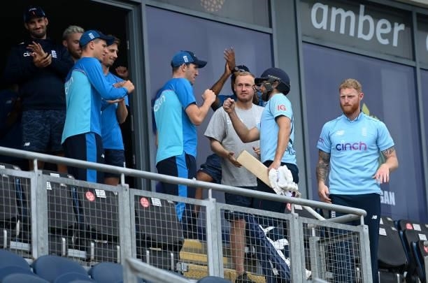 Dawid Malan of England celebrates with captain Ben Stokes winning the 1st Royal London Series One Day International match between England and...