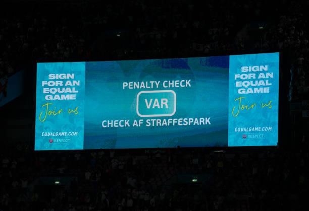 The electronic scoreboard displaying a penalty check by VAR for the England winning penalty during the UEFA Euro 2020 Championship Semi-final match...
