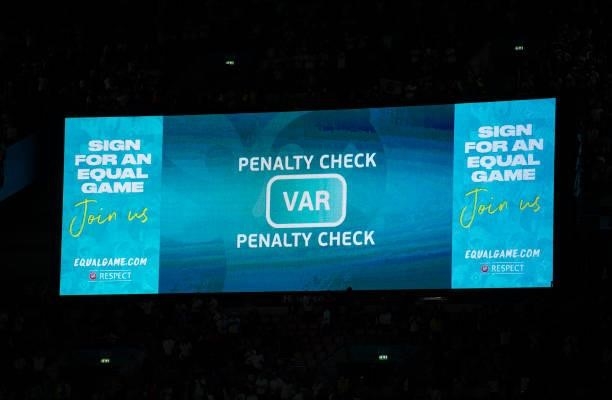 The electronic scoreboard displaying a penalty check by VAR for the England winning penalty during the UEFA Euro 2020 Championship Semi-final match...