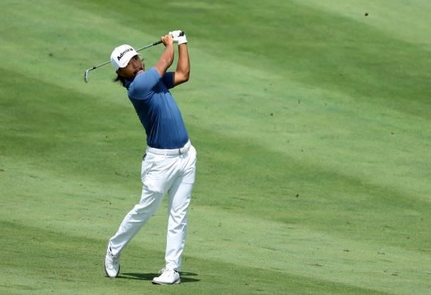 Satoshi Kodaira of Japan plays his second shot on the 15th hole during the first round of the John Deere Classic at TPC Deere Run on July 08, 2021 in...