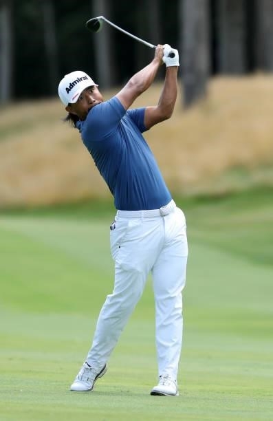 Satoshi Kodaira of Japan plays his second shot on the 17th hole during the first round of the John Deere Classic at TPC Deere Run on July 08, 2021 in...