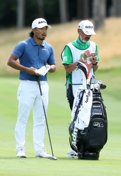 Satoshi Kodaira of Japan prepares to play his second shot on the 17th hole during the first round of the John Deere Classic at TPC Deere Run on July...