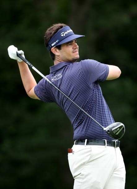 Beau Hossler plays his shot from the 13th tee during the first round of the John Deere Classic at TPC Deere Run on July 08, 2021 in Silvis, Illinois.