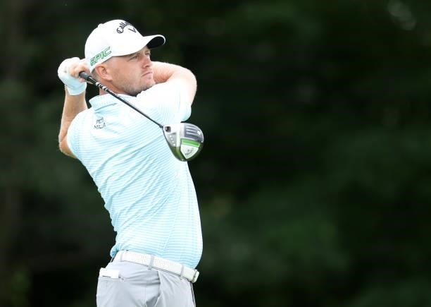 Tom Lewis of England plays his shot from the 13th tee during the first round of the John Deere Classic at TPC Deere Run on July 08, 2021 in Silvis,...