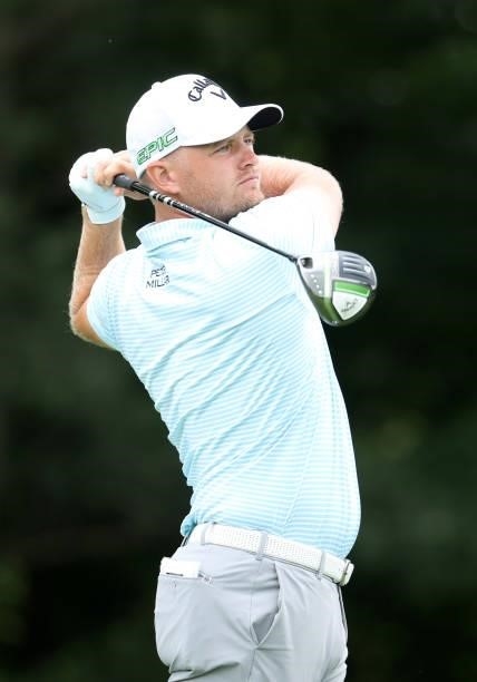 Tom Lewis of England plays his shot from the 13th tee during the first round of the John Deere Classic at TPC Deere Run on July 08, 2021 in Silvis,...