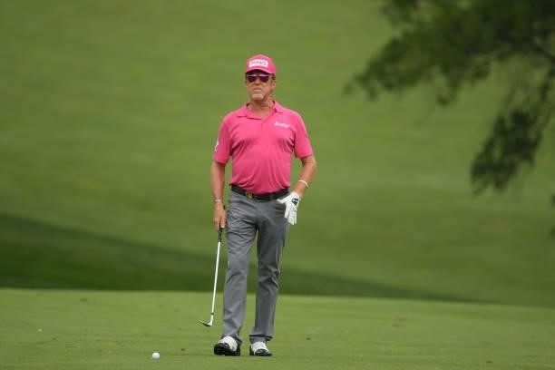 Miguel Angel Jimenez of Spain plays his approach shot on the first hole during the first round of the U.S. Senior Open Championship at the Omaha...