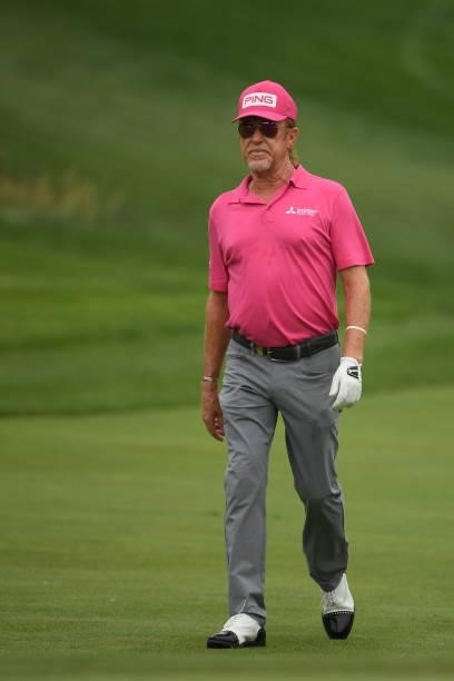 Miguel Angel Jimenez of Spain walks the fairway on the first hole during the first round of the U.S. Senior Open Championship at the Omaha Country...