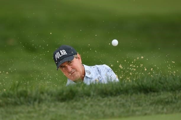 Gene Sauers plays his shot on the eighth hole during the first round of the U.S. Senior Open Championship at the Omaha Country Club on July 08, 2021...