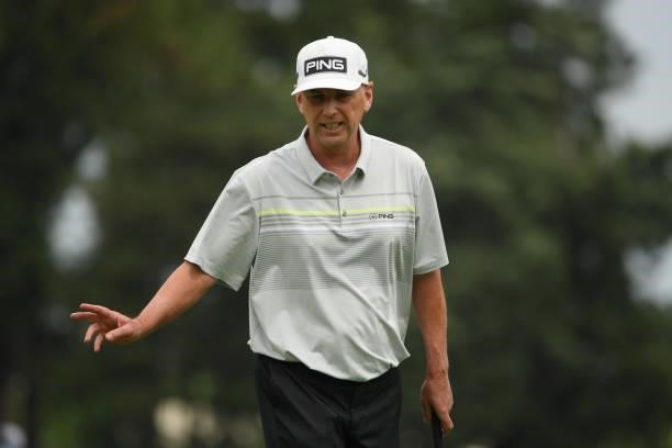 Kevin Sutherland reacts after his putt on the first hole during the first round of the U.S. Senior Open Championship at the Omaha Country Club on...