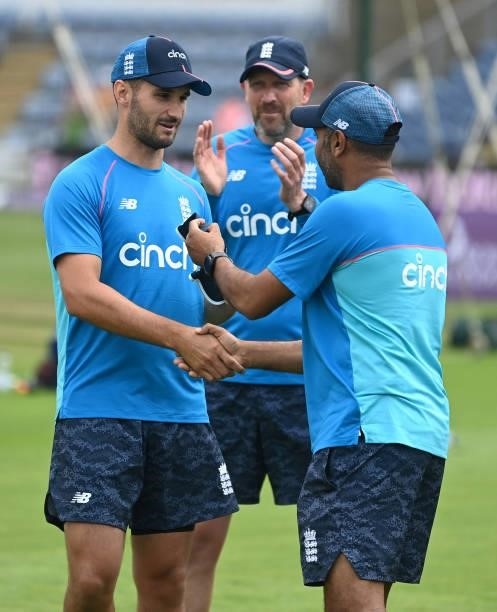Lewis Gregory of England is presented with his ODI cap by Jeetan Patel ahead of the 1st Royal London Series One Day International match between...
