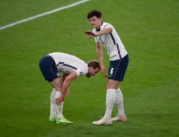 Harry Maguire and Harry Kane of England during the UEFA Euro 2020 Championship Semi-final match between England and Denmark at Wembley Stadium on...