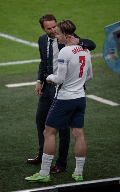 England manager Gareth Southgate with substitute Jack Grealish during the UEFA Euro 2020 Championship Semi-final match between England and Denmark at...