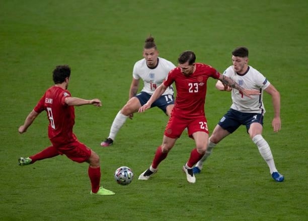 Declan Rice and Kalvin Phillips of England in action with Thomas Delaney and Pierre-Emile Højbjerg of Denmark during the UEFA Euro 2020 Championship...